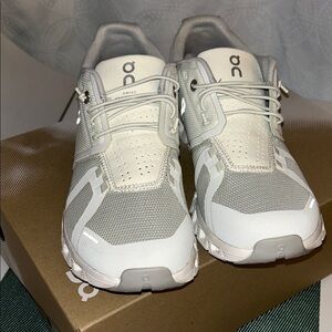 On Running Light Gray and White Athletic Shoes